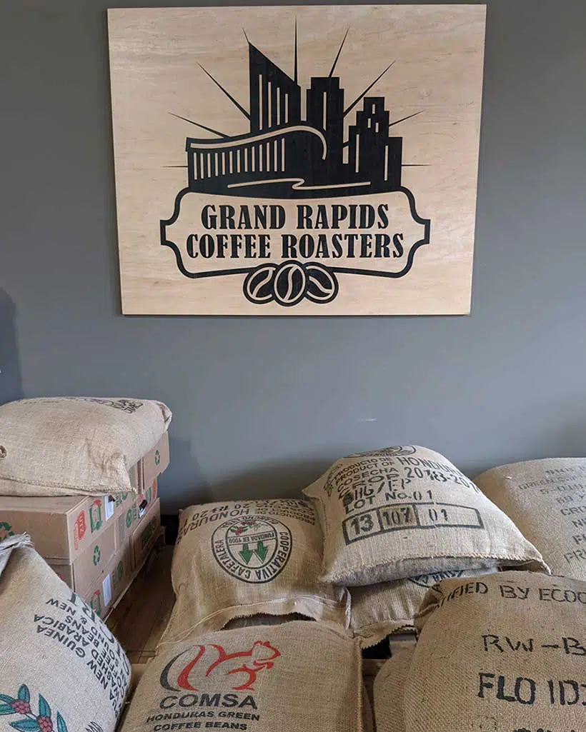 bags of imported coffee inside grand rapids coffee roasters