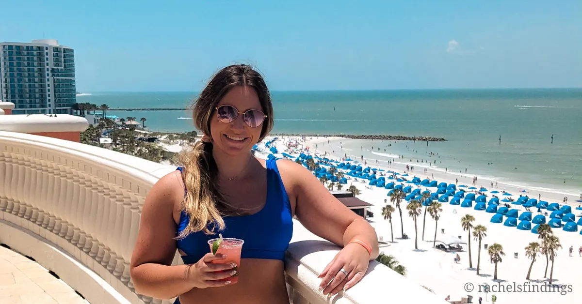 girl with cocktail on clearwater beach hotel pooldeck