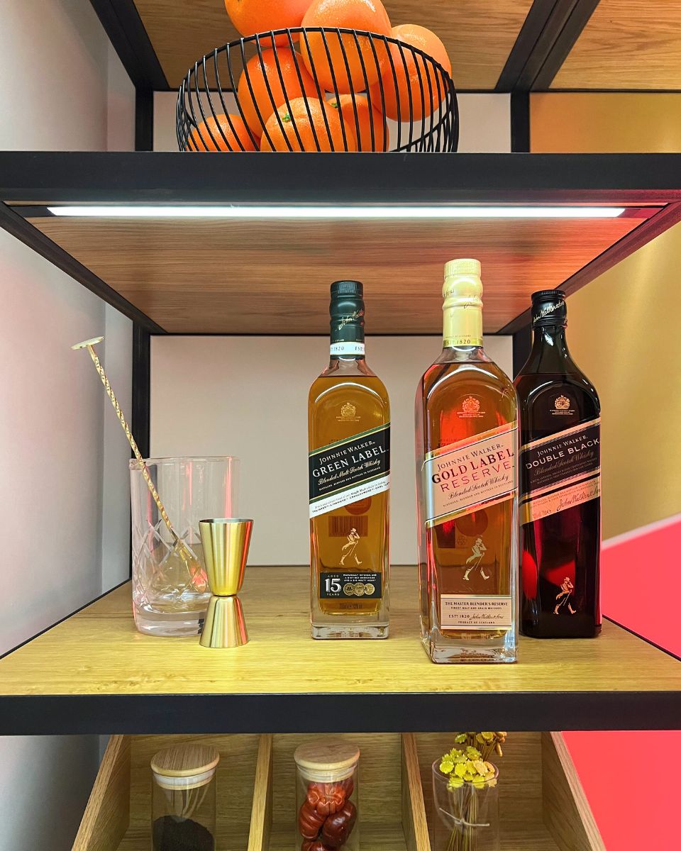 shelf of johnnie walker whiskies